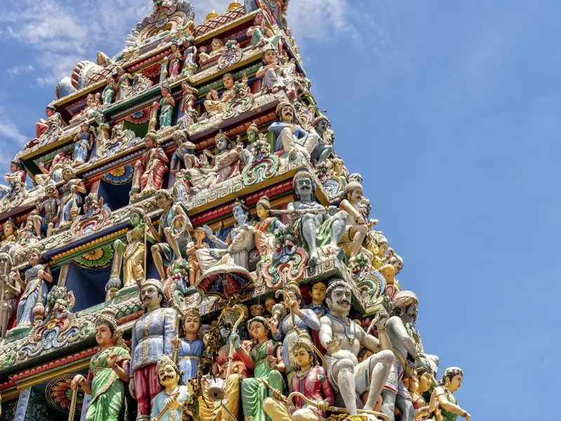 In Madurai erwartet Sie auf Ihrer Rundreise durch Südindien ein Wolkenkratzer mit Göttern in Bonbonfarben – der Sri-Minakshi-Tempel, die größte Tempelanlage Indiens.