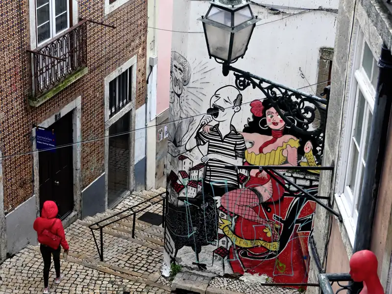 Auf Ihrer Städtereise nach Lissabon kommen Sie immer wieder an Wandbildern, den Murales, vorbei.